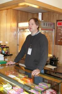 Ian behind candy counter
